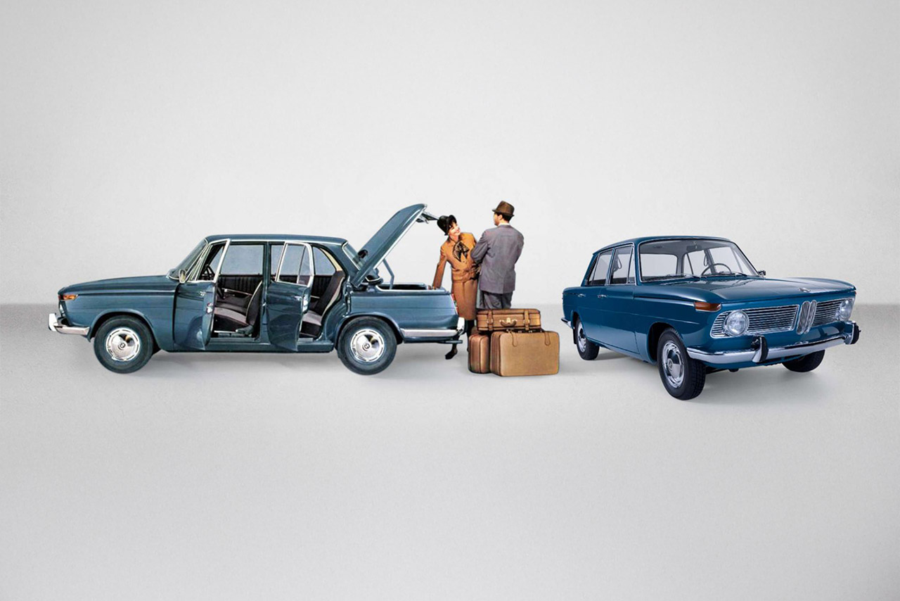 Classic BMW 1500 car with opened trunk and passengers
