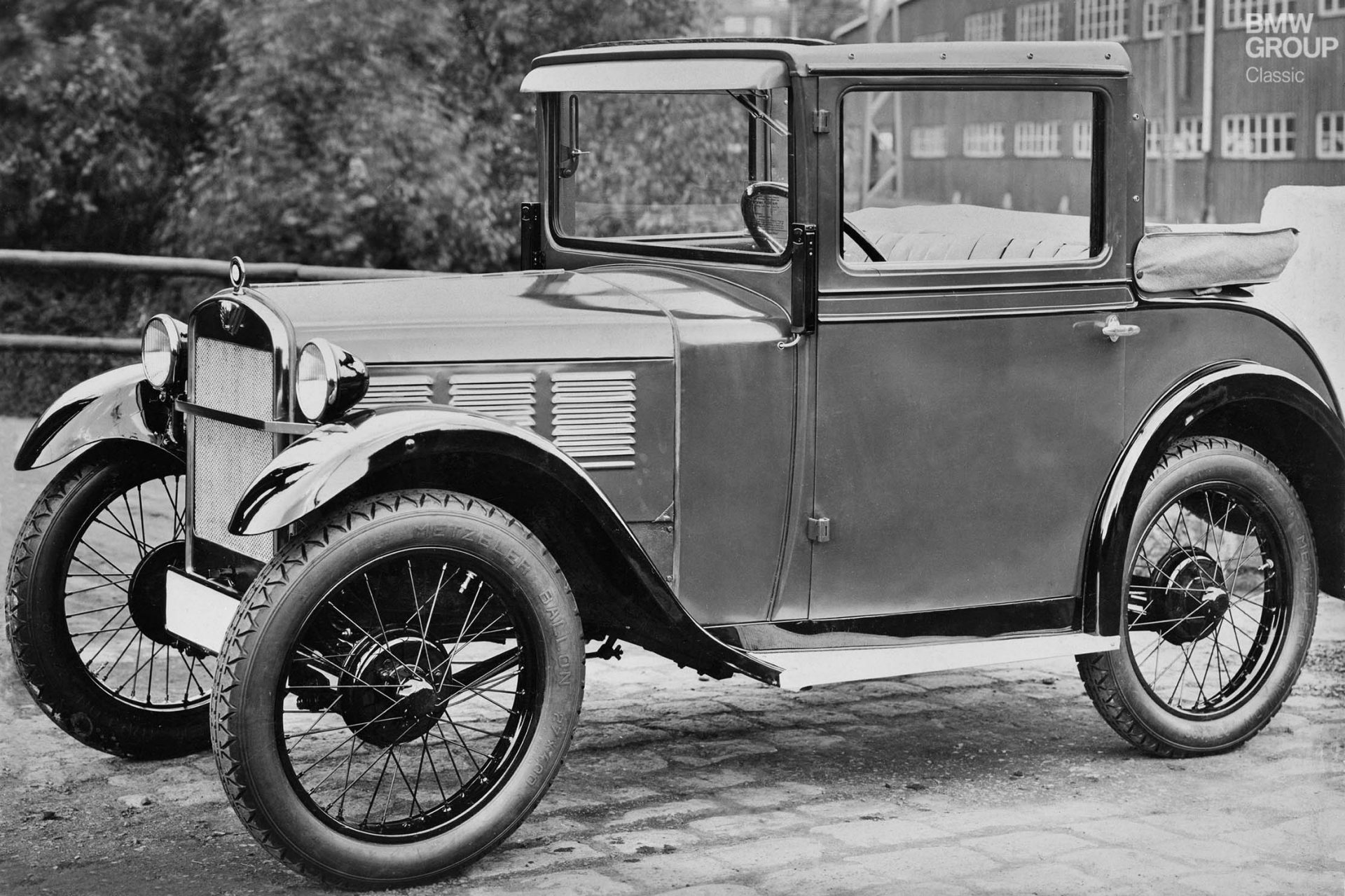 BMW made its first foray into car manufacturing with the BMW 3/15 in 1929. This photograph of a BMW 3/15 DA 2 Kabriolett was taken in 1930.
