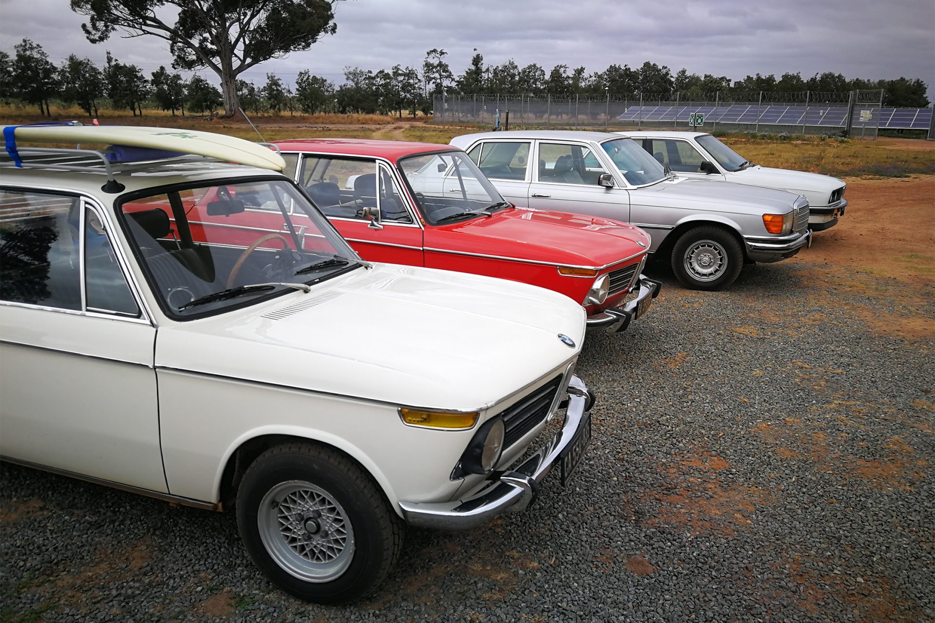 Four cars in a lonely landscape