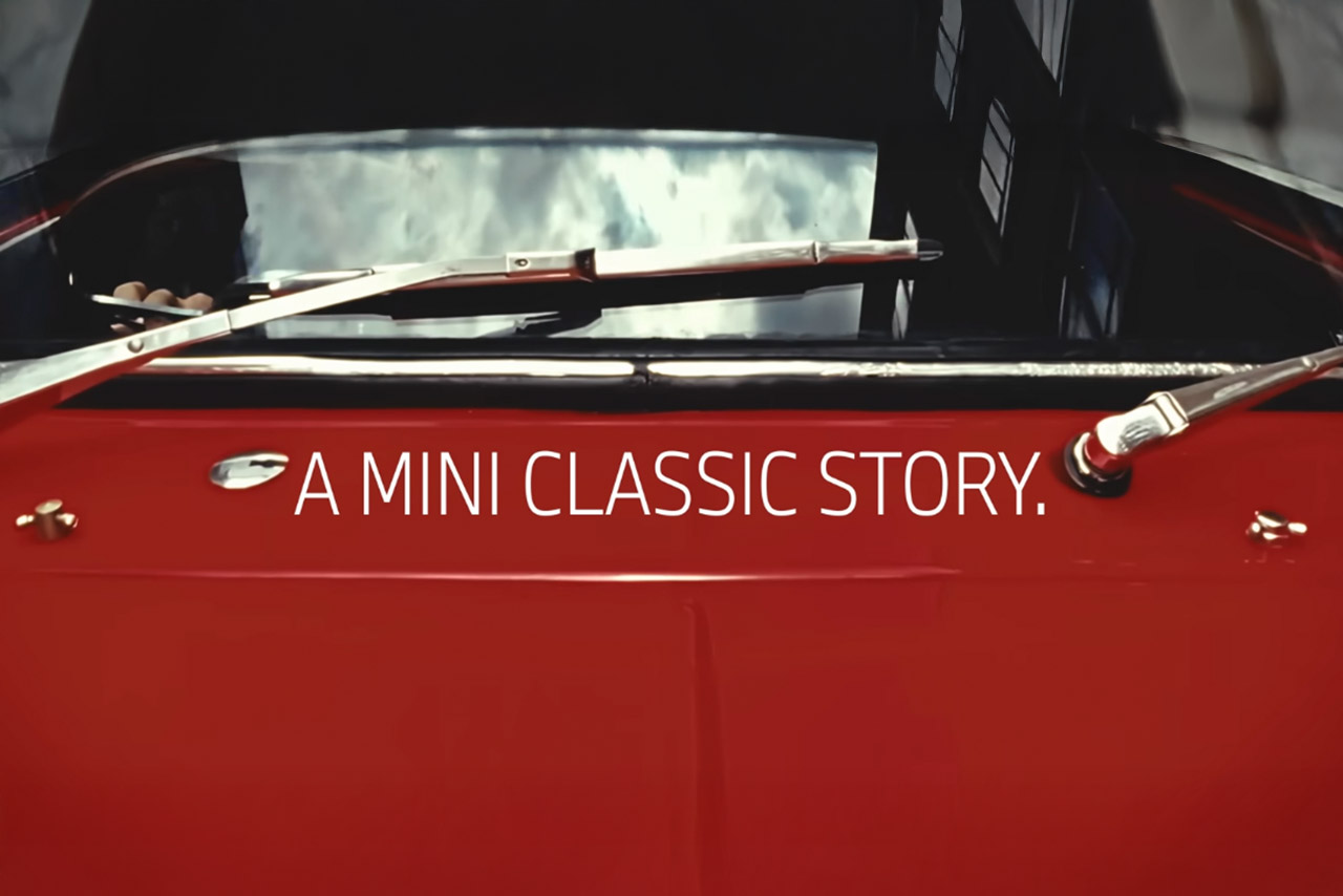 A red car with the words "A MINI classic story" written on the side.