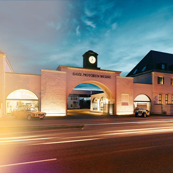 The big entrance gate of BMW Group Classic at sunset.