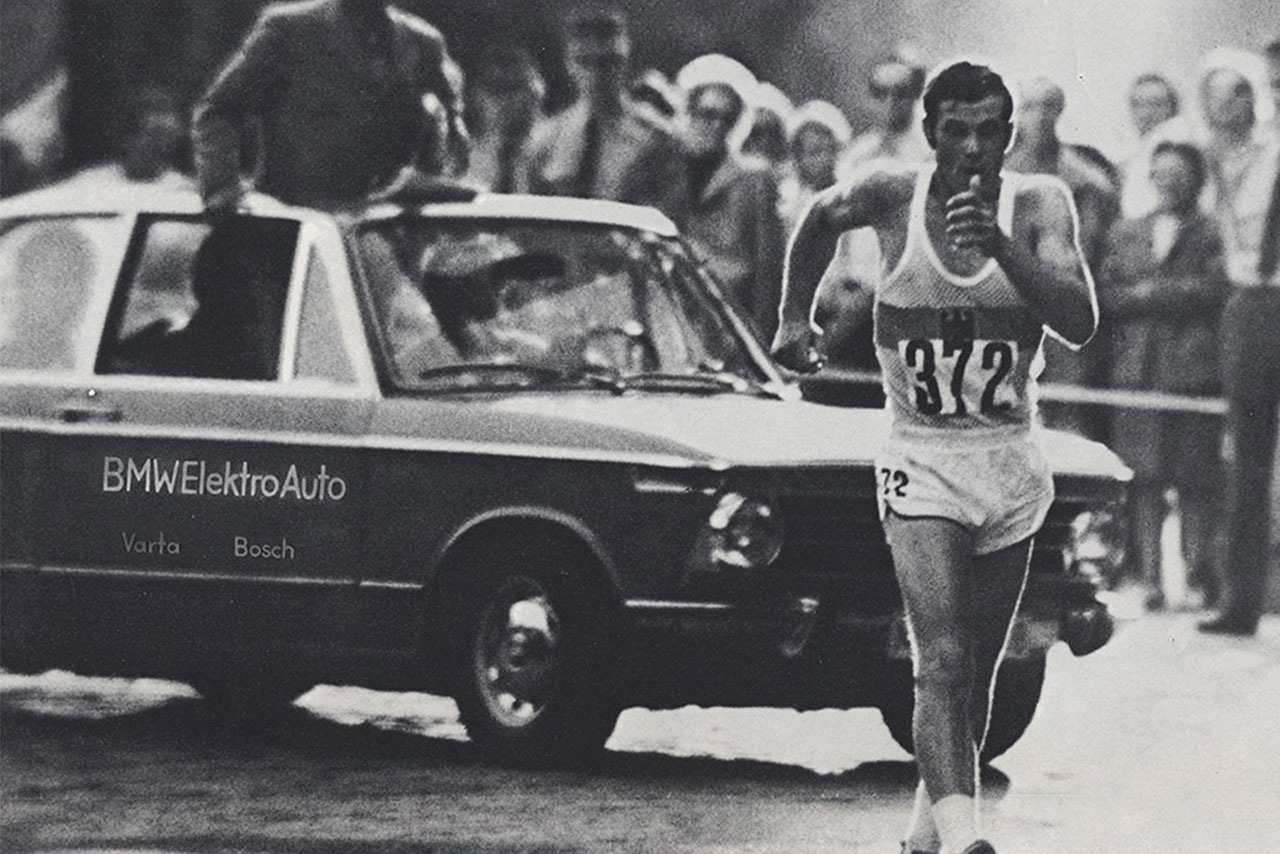 Olympian with the Electric BMW 1602 in the background